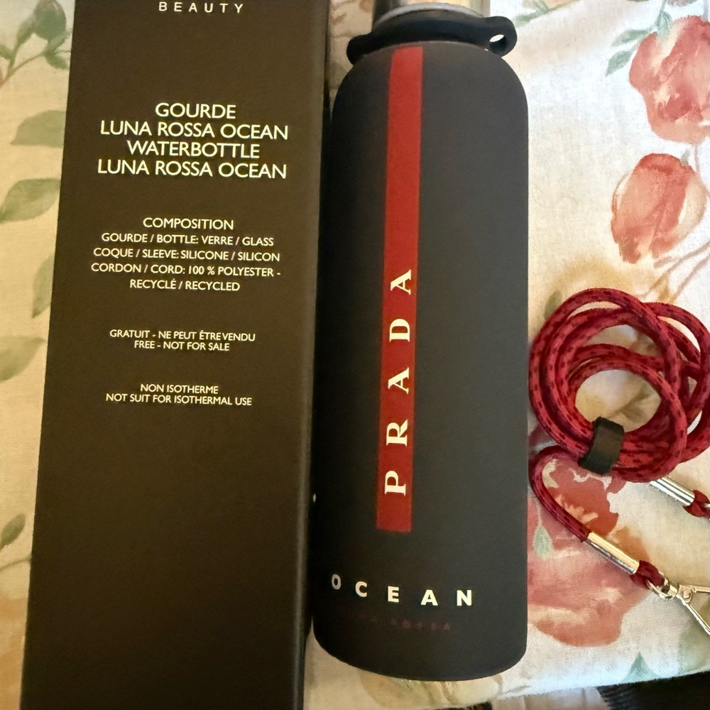 Prada Navy blue bottle with Red Stripe
